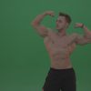 Green-Screen-Blone_Bodybuilder_Demonstrating_Front_Double_Biceps_And_Lateral_Spread_Positions_On_Green_Screen_Wall_Background_003-1000×563